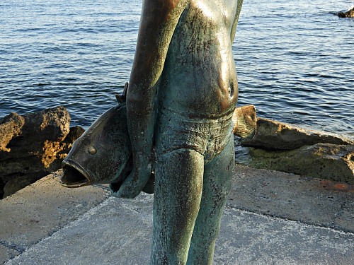 Paphos
Sculpture of a small fisherman on the side of the Harbor&nbsp; in Kato Paphos.While you are walking by the sea of the beautifull Harbor, you can run into one of many lovely statues made by a famous artist of the town<br />

Marcela Michaelidou